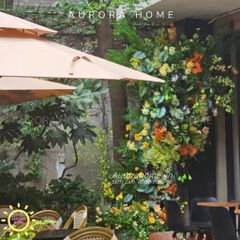 Set up tiểu cảnh cột cây hoa giả nhiệt đới trang trí quán cafe