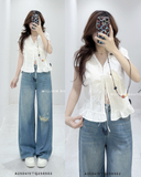  Quần jean ống rộng rách gối 89850 