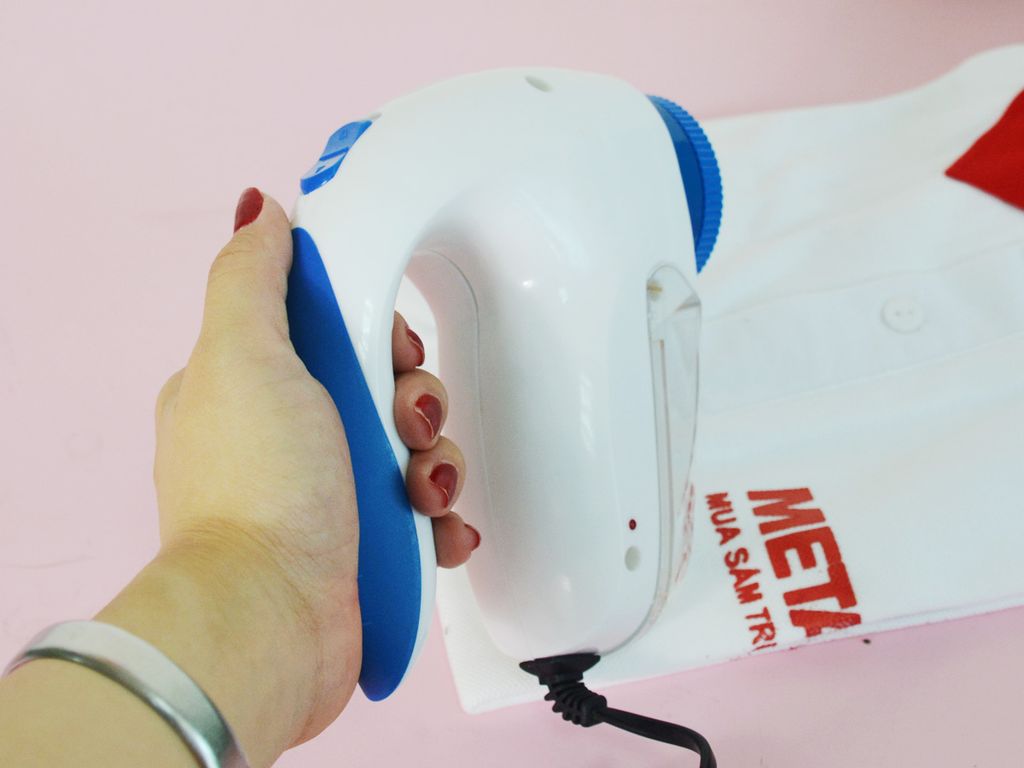 Máy cắt lông xù quần áo Hando