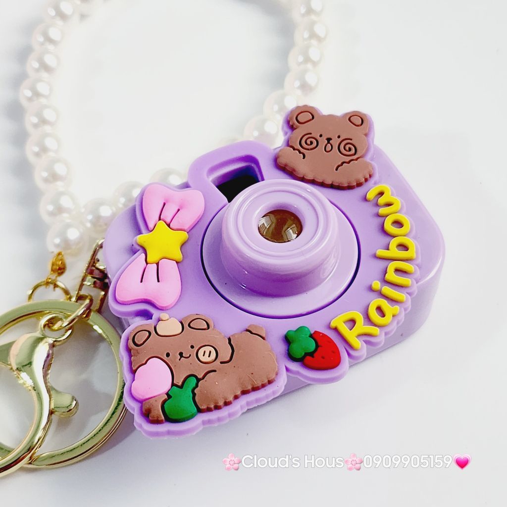 Móc Khóa Máy Ảnh Gấu tím Rainbow Có đèn kèm charm ngọc trai