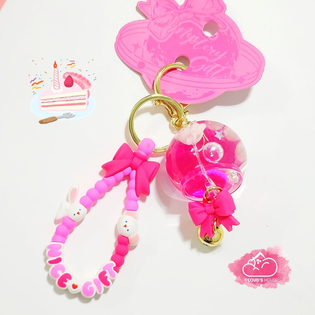 Móc khóa Hình tròn Bling bling nước hồng kèm charm nice gift