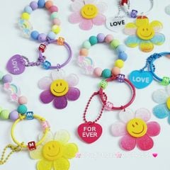 Vòng charm đeo tay hoạt hình kute Bông hoa Mặt Cười