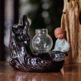  Thác khói trầm hương chú tiểu bằng gốm sứ CTM1 