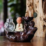  Thác khói trầm hương chú tiểu bằng gốm sứ CTM1 