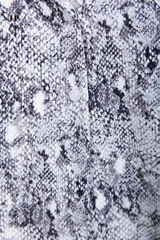 Sơ mi họa tiết phom rộng