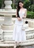  ĐẦM MIDI CỔ VUÔNG XẺ TÀ PHỐI REN LƯỚI K CLOSET D1020 