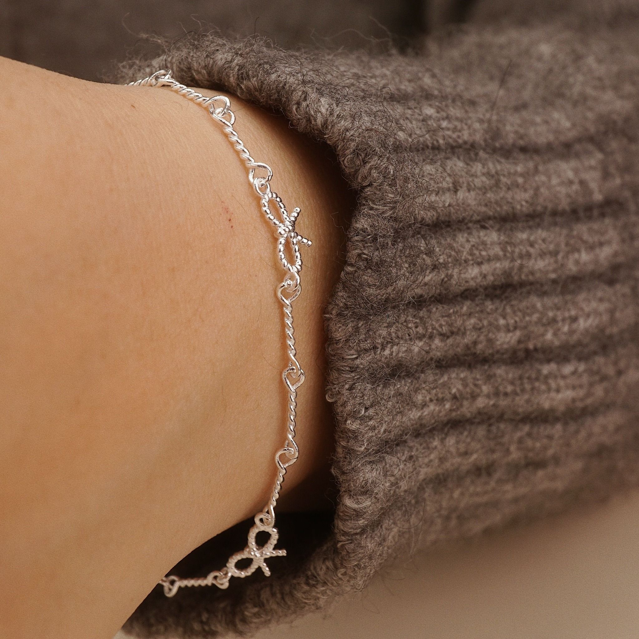  TRIPLE BOW LINK BRACELET (S) 
