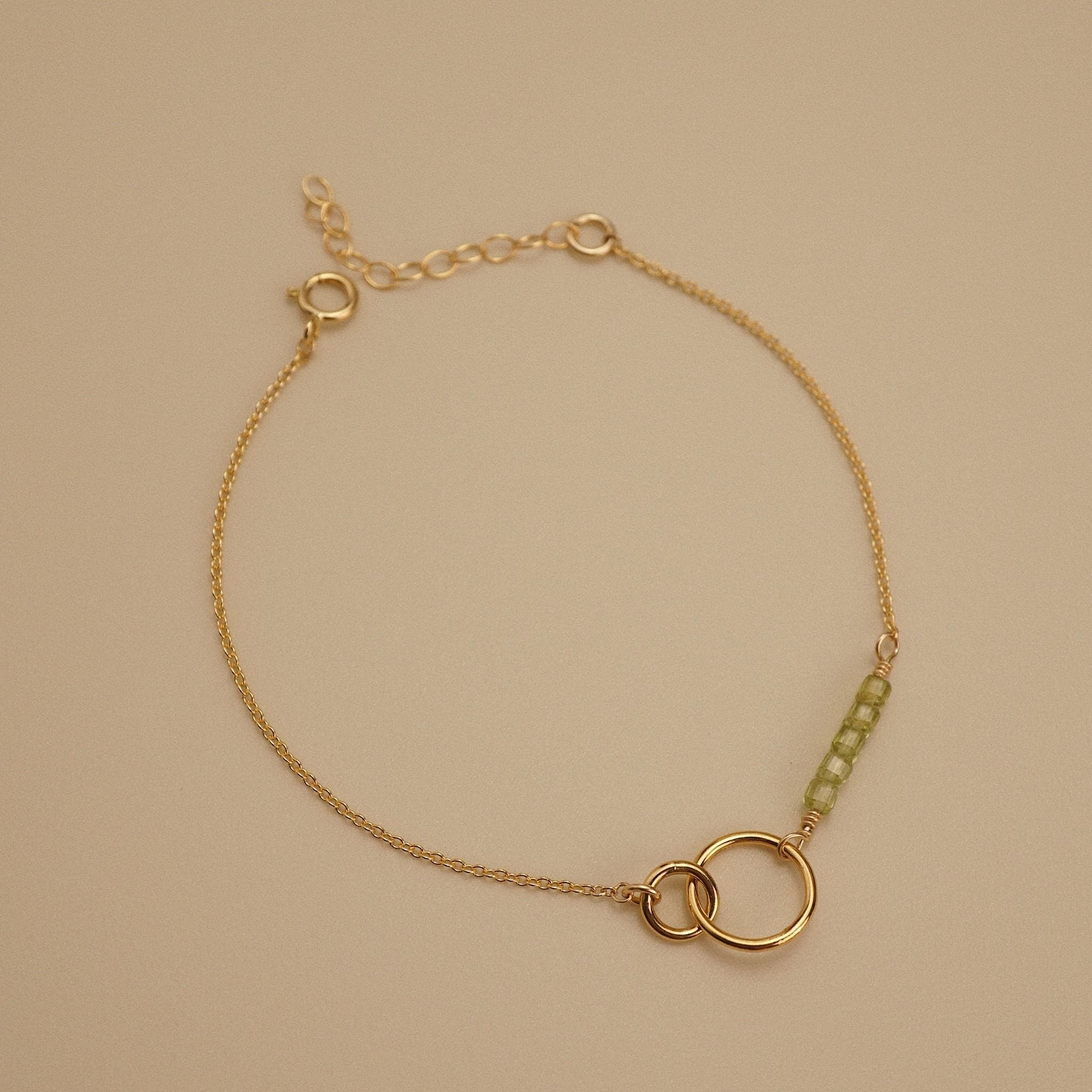  INTERLOCKING CIRCLE PERIDOT BRACELET 