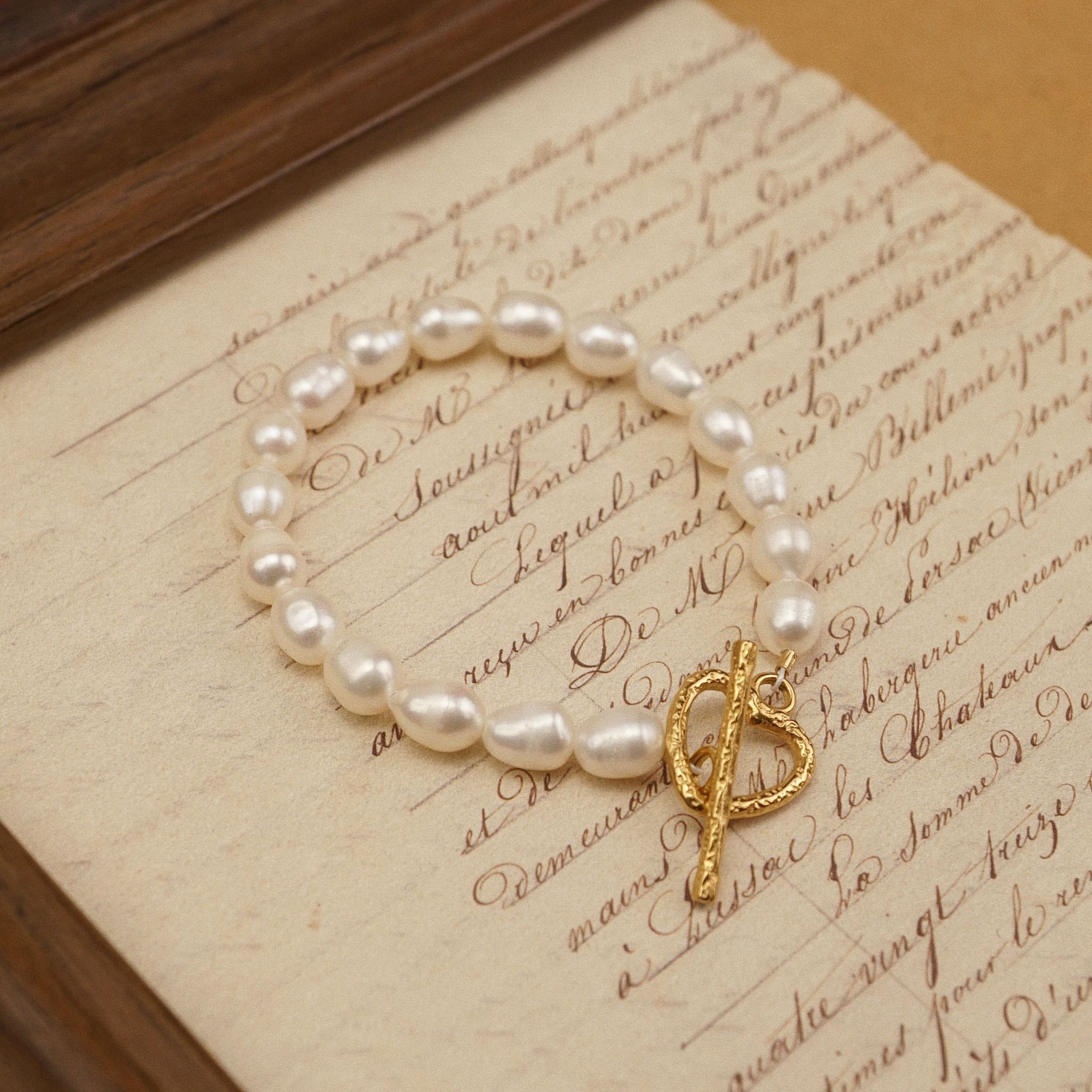  HAMMER HEART CLASP BOLD RICE SHAPE PEARL BRACELET 