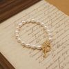  HAMMER HEART CLASP BOLD RICE SHAPE PEARL BRACELET 