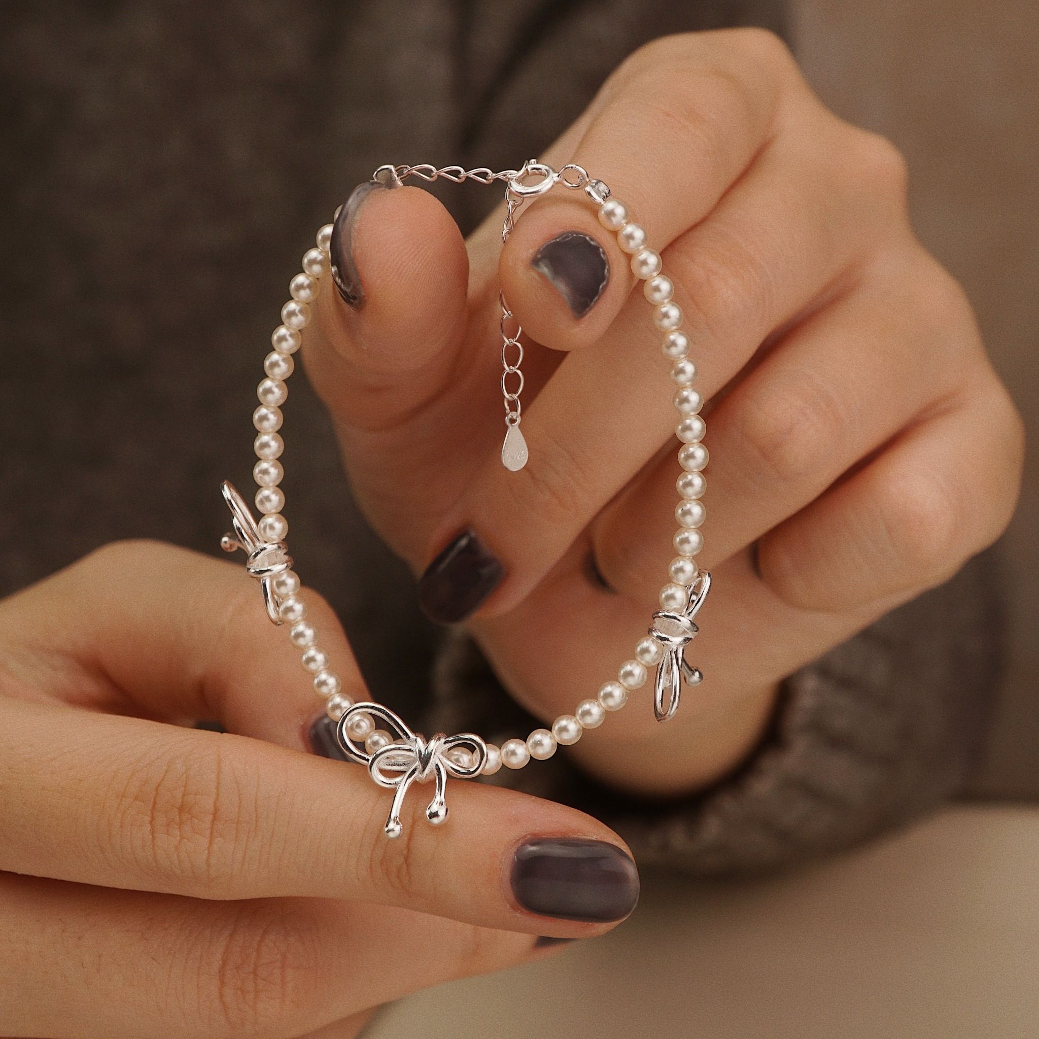  TRIPLE BOW ROUND PEARL BRACELET (S) 