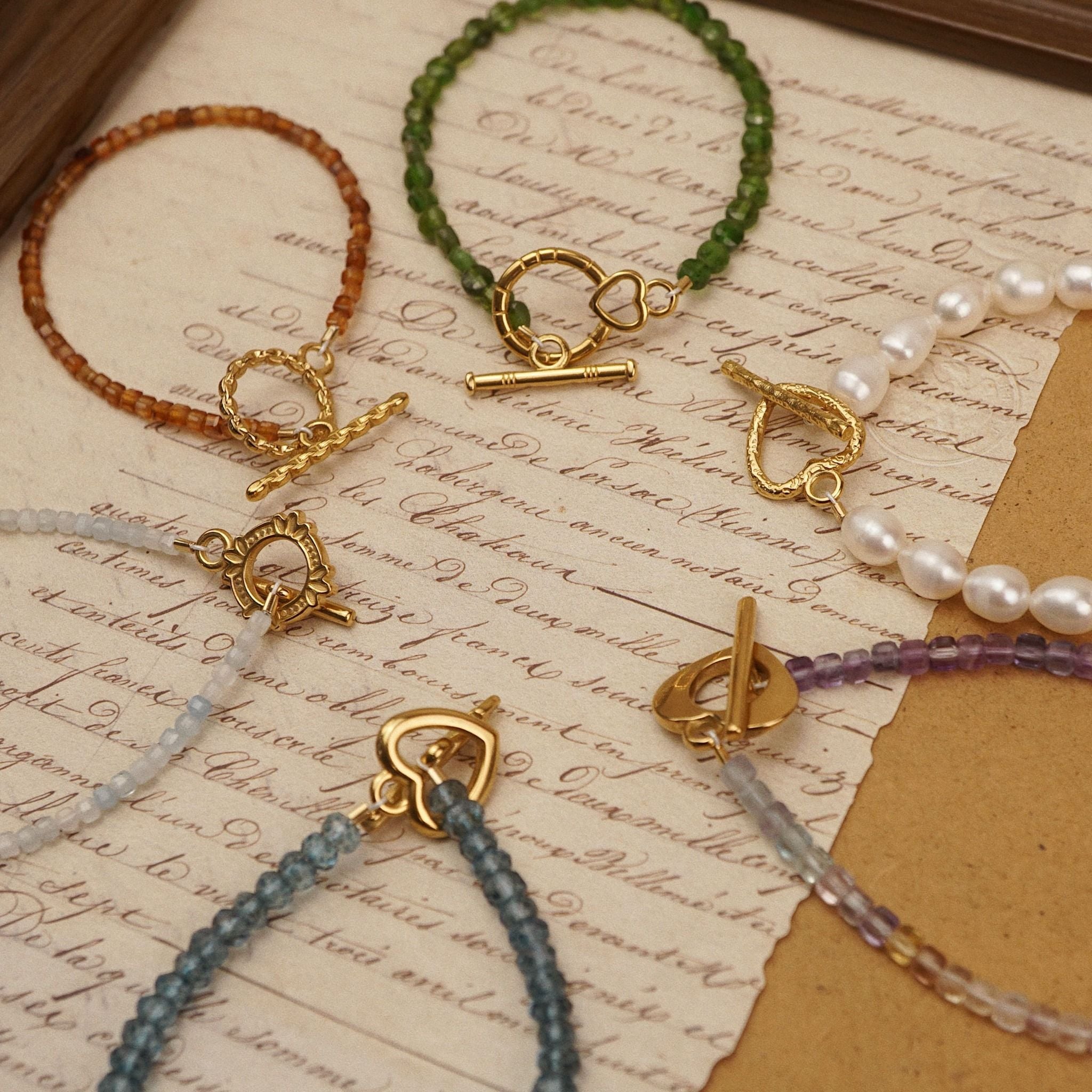  HAMMER HEART CLASP BOLD RICE SHAPE PEARL BRACELET 