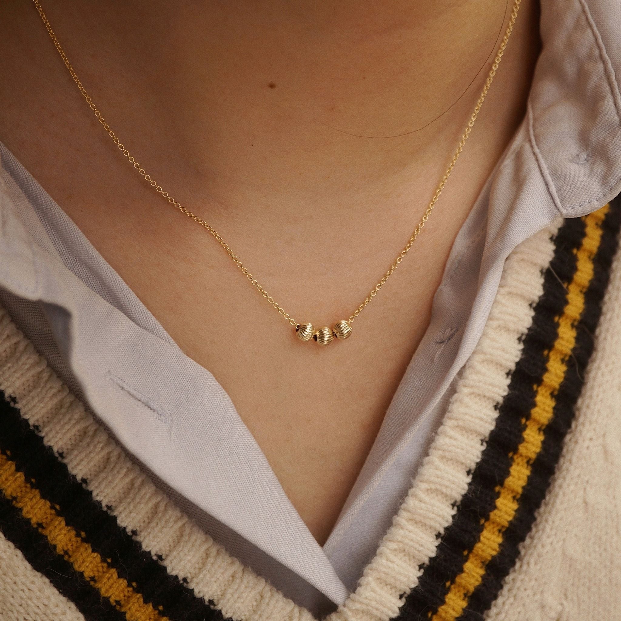  TRIPLE ORBIT NECKLACE 