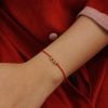  TRIPLE ORBIT RED LUCKY STRING BRACELET 