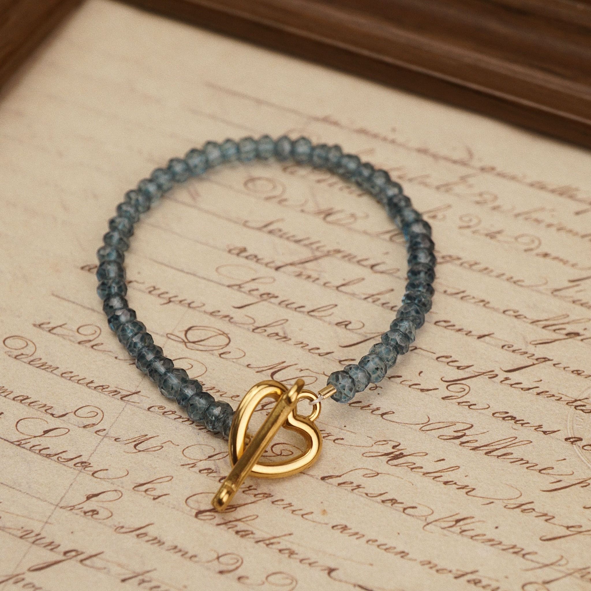  CUPID CLASP TOPAZ BRACELET 