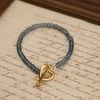  CUPID CLASP TOPAZ BRACELET 