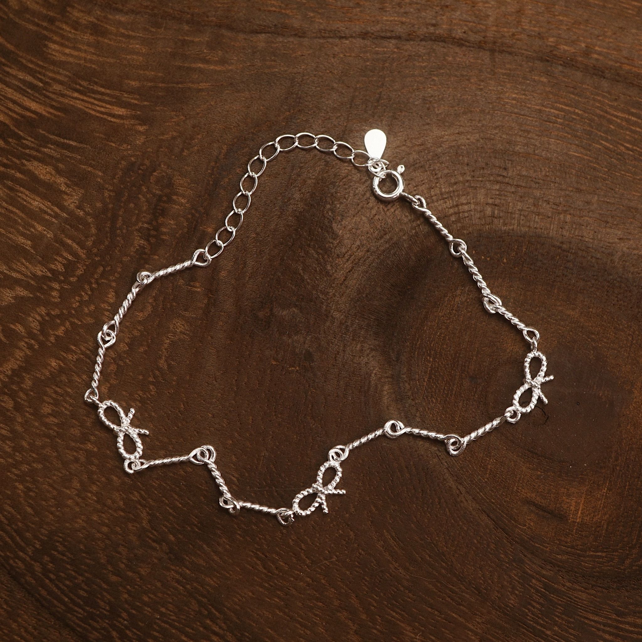  TRIPLE BOW LINK BRACELET (S) 