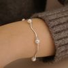  ROUND PEARL RIPPLE BRACELET (S) 