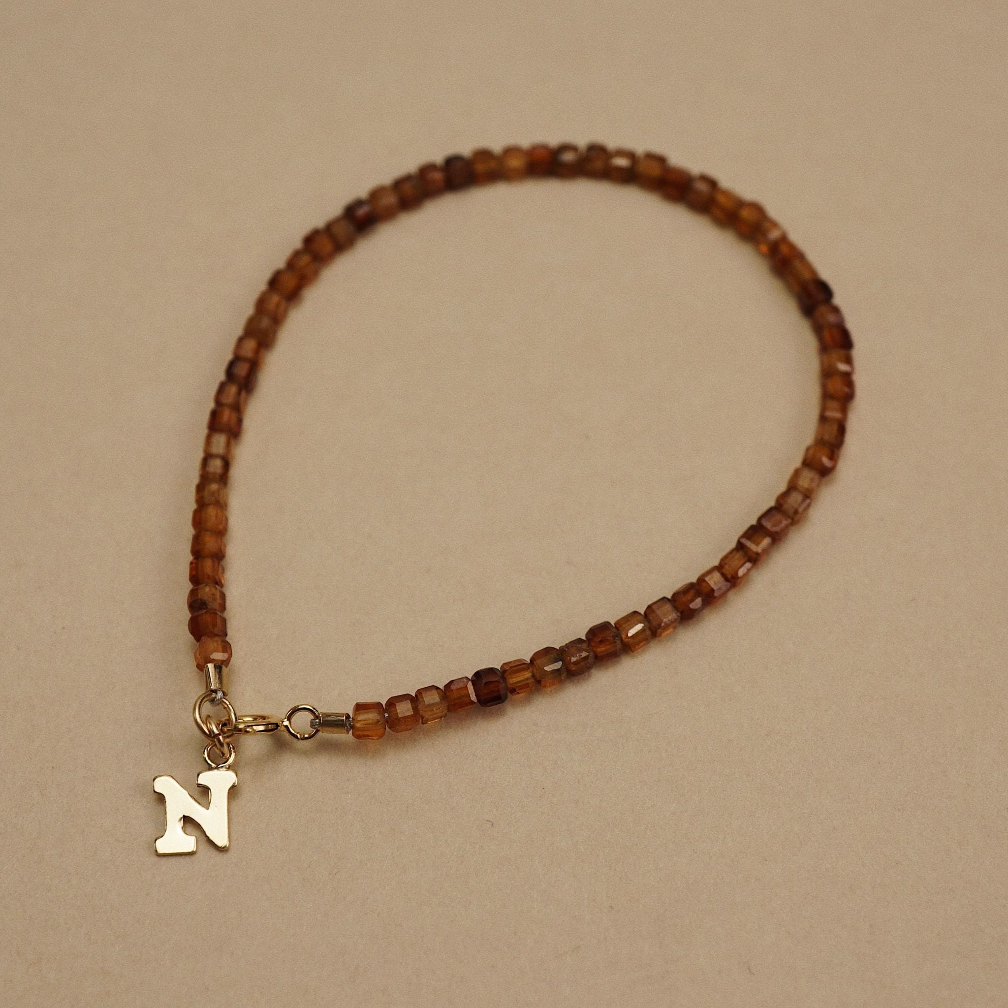  LETTER - GARNET BRACELET 
