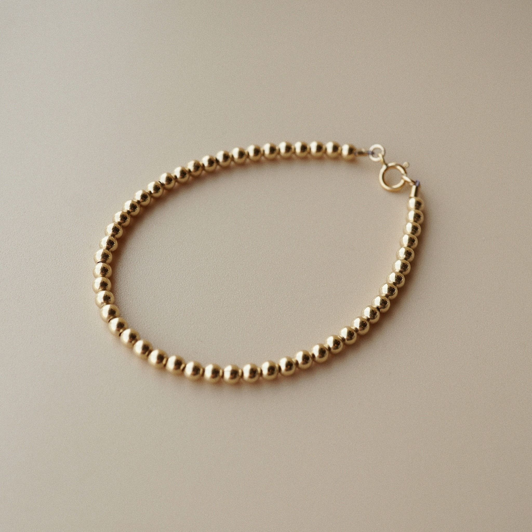  ROUND BEADED BRACELET 