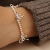  TRIPLE BOW ROUND PEARL BRACELET (S) 