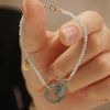  SHELL - INTERLOCKING JADE STONE BRACELET 
