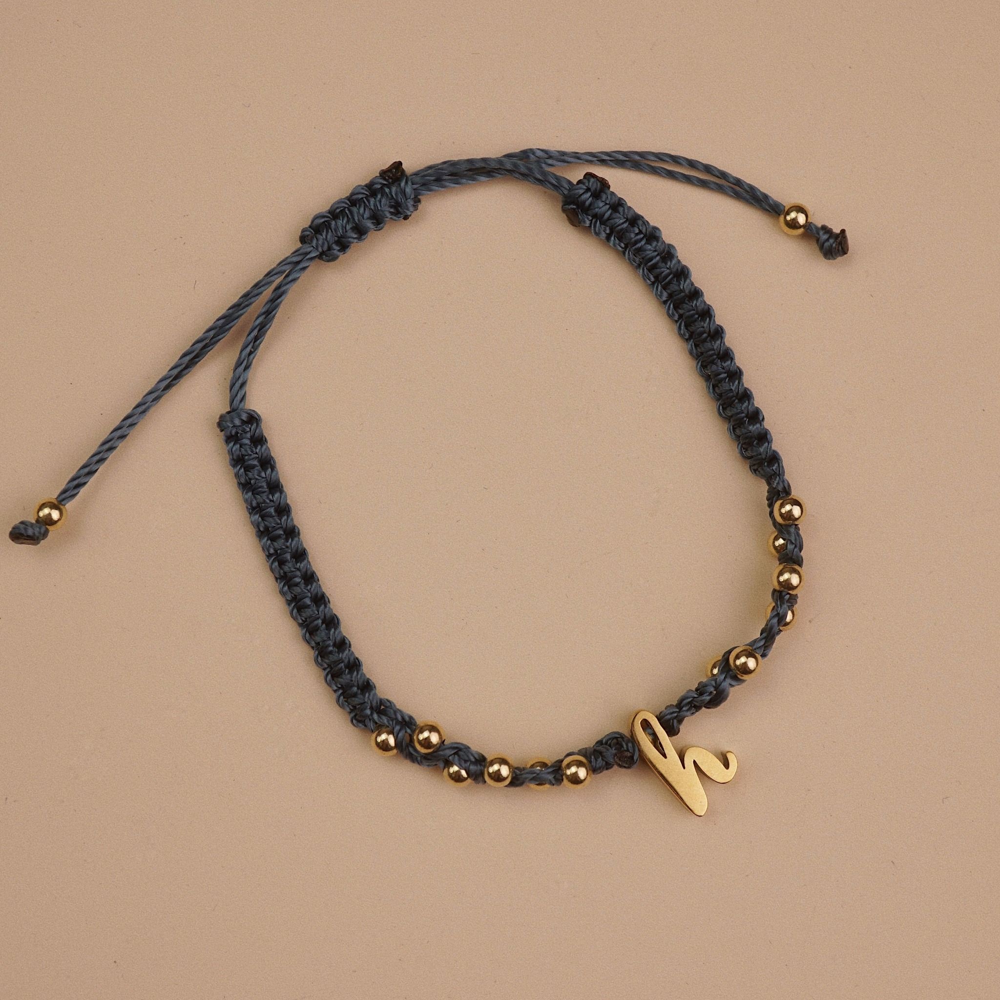  HOLLOW LETTER BEADED STRING BRACELET 
