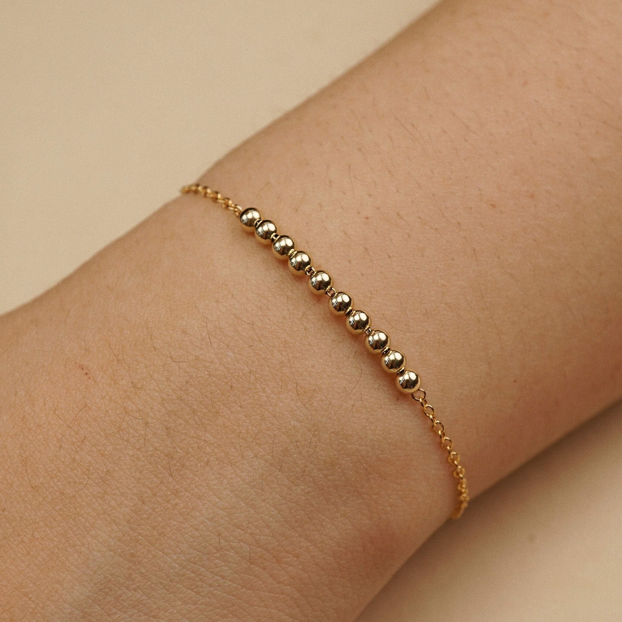  10 - ROUND BEADED BRACELET 