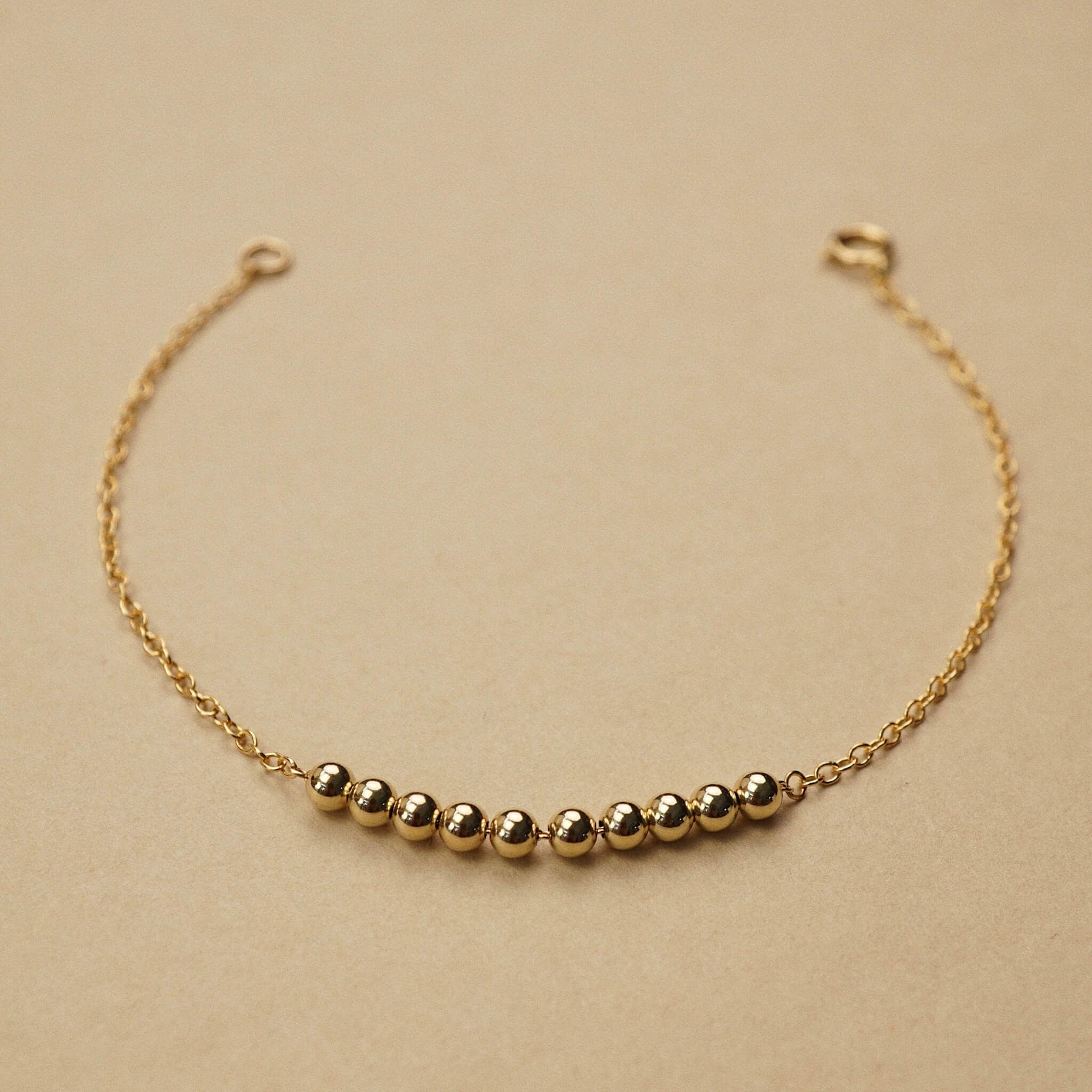  10 - ROUND BEADED BRACELET 