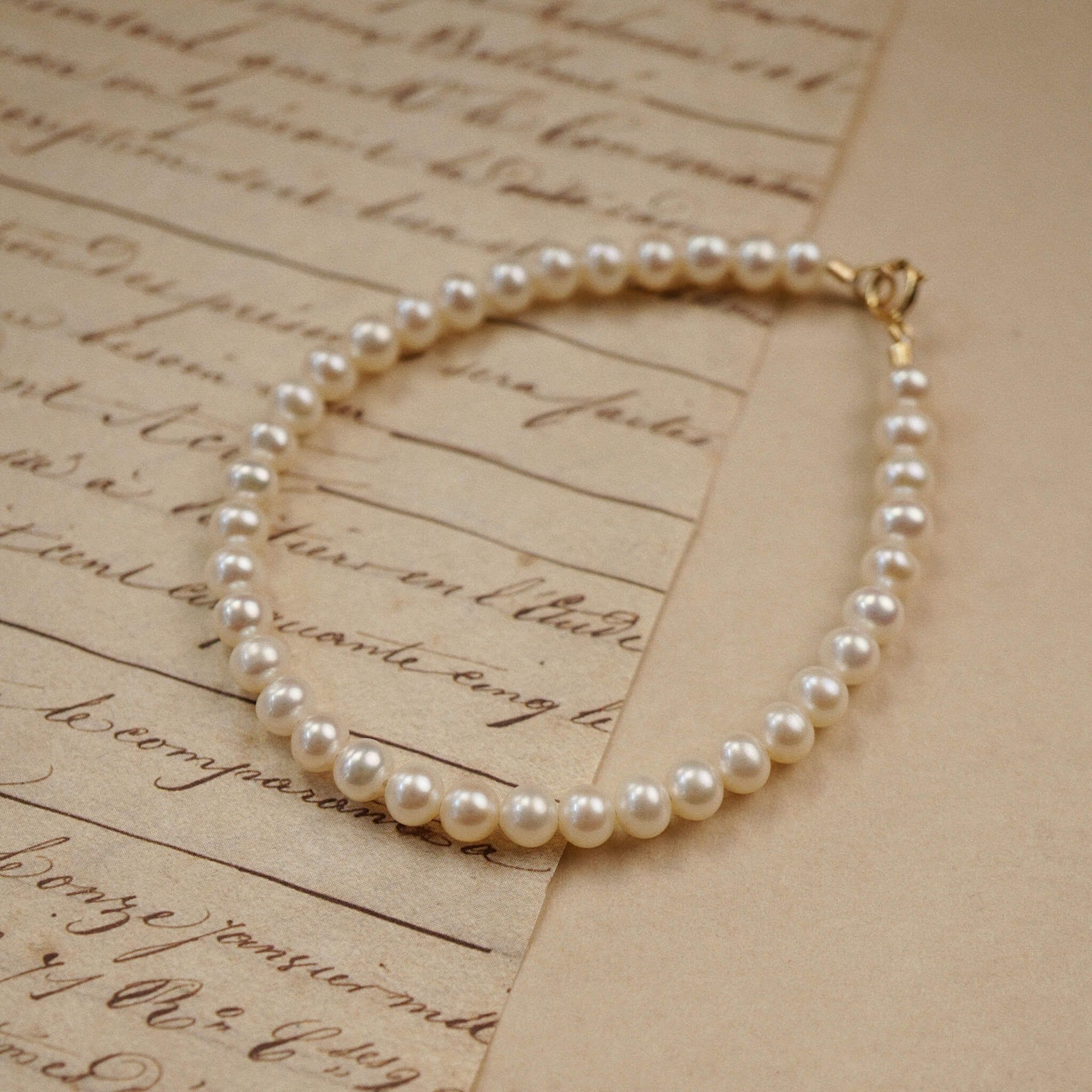  ROUND PEARL BRACELET 