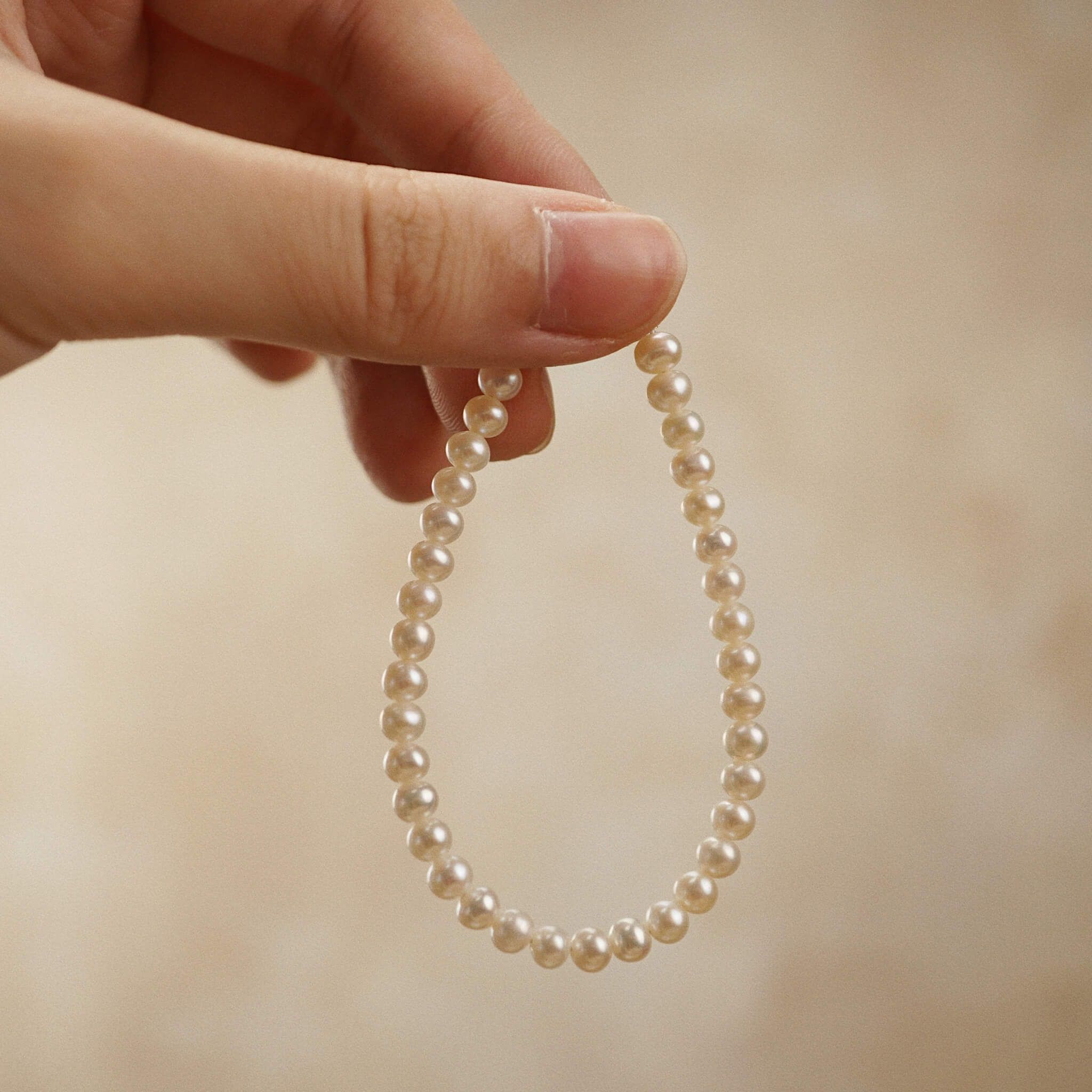  ROUND PEARL BRACELET 