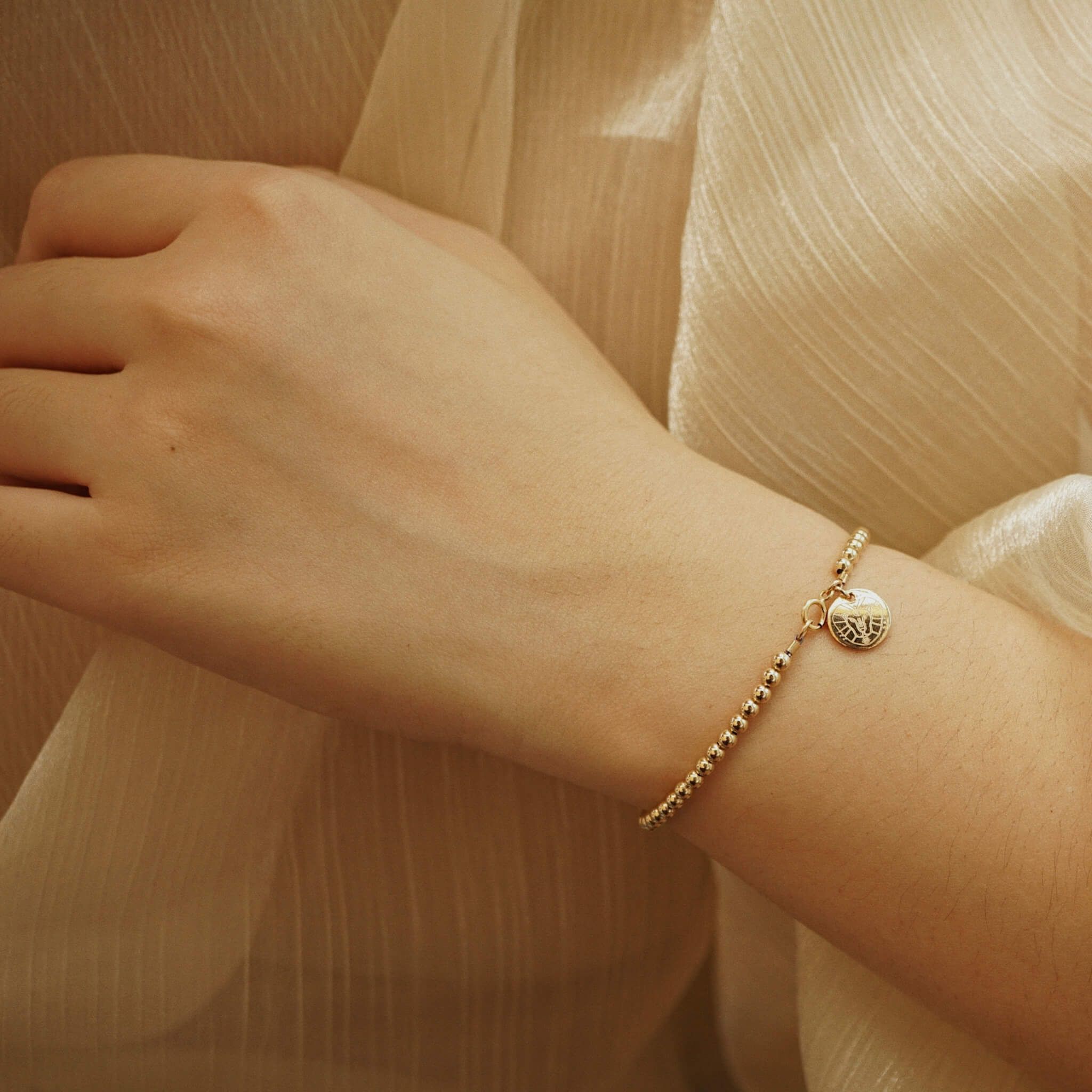  DISC - ROUND BEADED BRACELET 