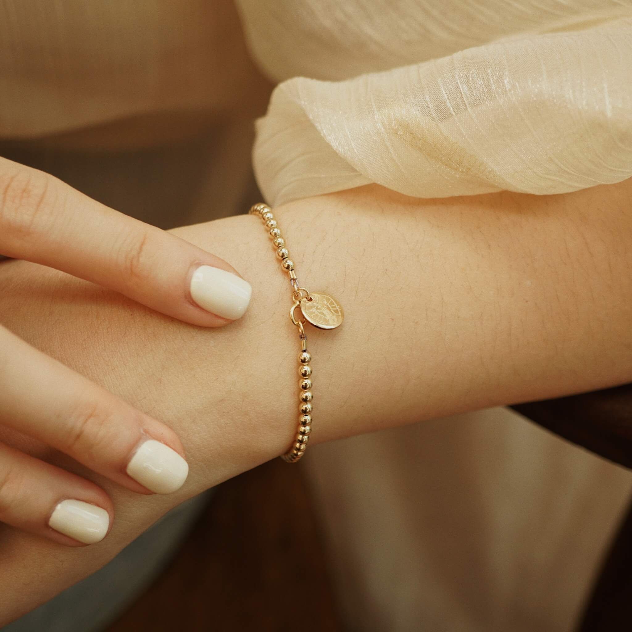  DISC - ROUND BEADED BRACELET 