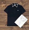  Áo Thun Polo Lacoste Men's Màu Đen Regular Fit Mẫu Mới Polyester Cổ Phối Chữ To 