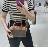  Túi Trống Mini Michael Kors Màu Nâu Logo 