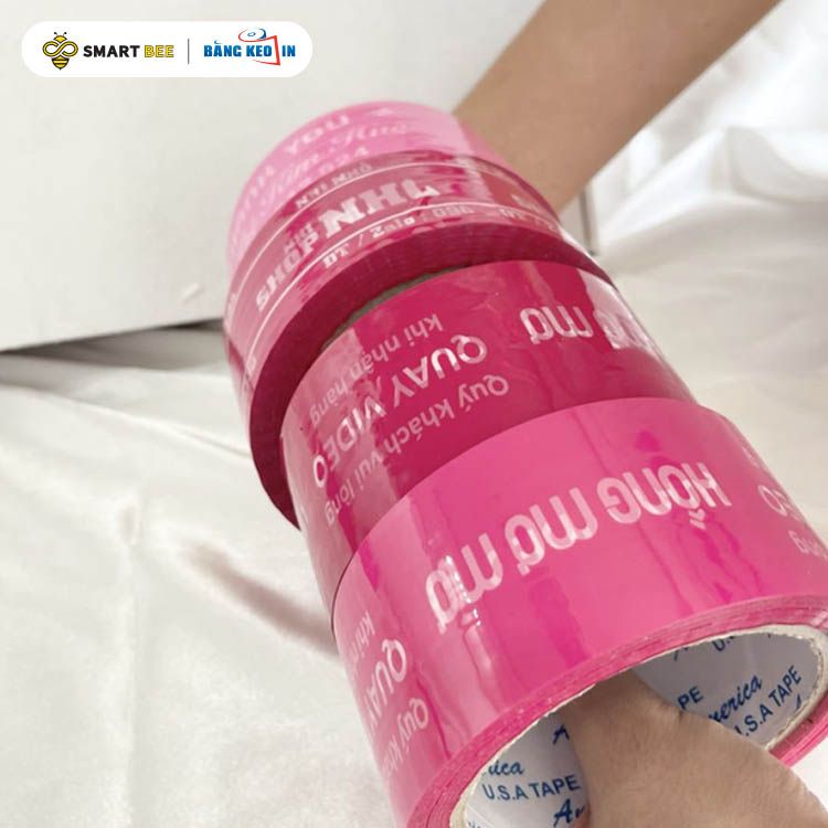  BĂNG KEO IN MÀU HỒNG & ĐEN [48MM x 72M] - CẶP MÀU THU HÚT KHÁCH HÀNG NGÀNH NƯỚC HOA 