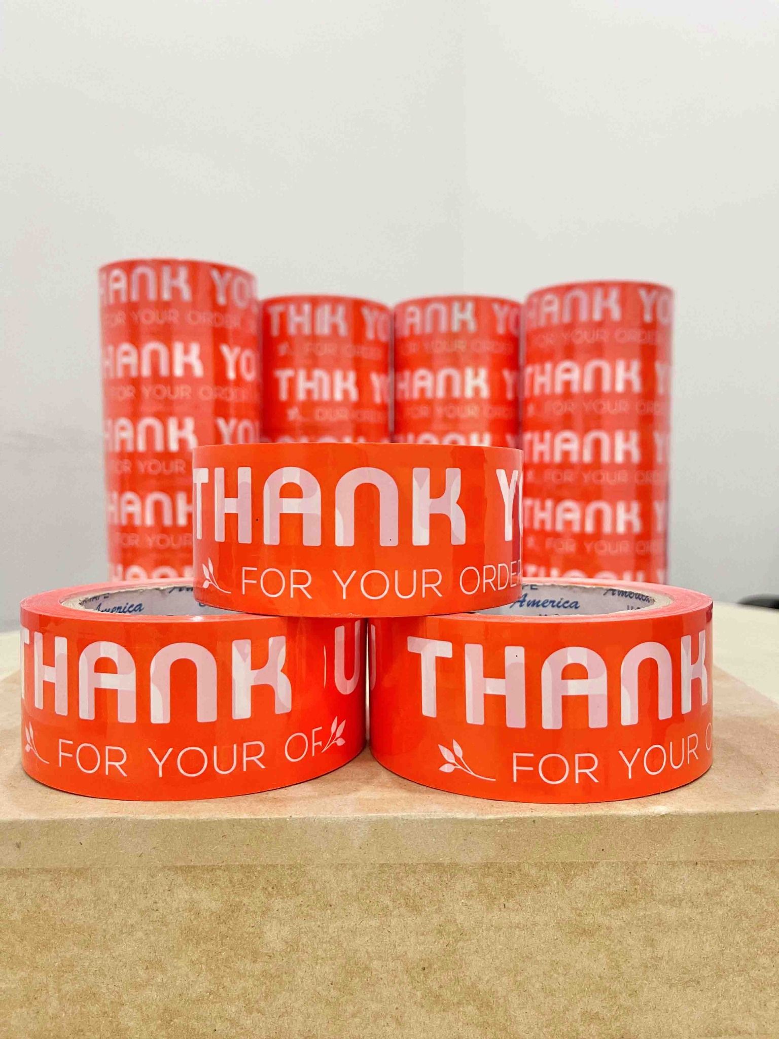  Băng keo in Thank You [48MMx72M] Màu nền Cam & Chữ Trắng Sữa 