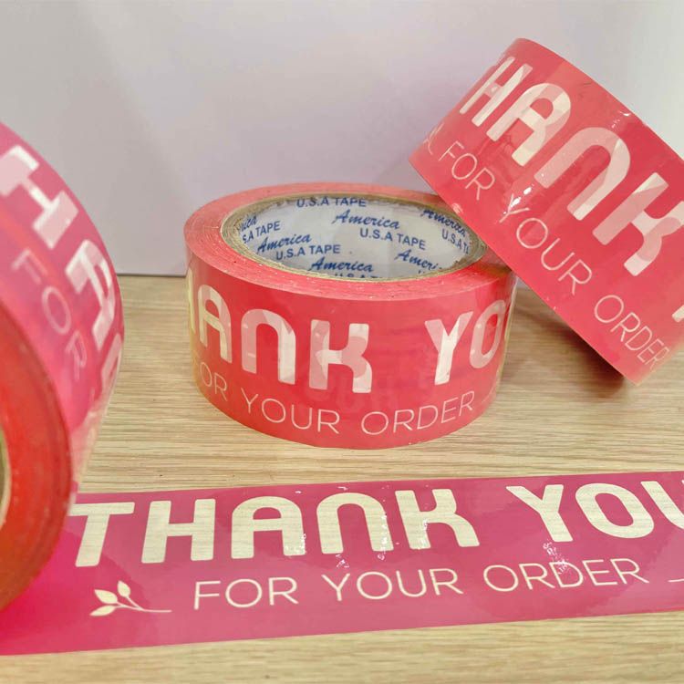  Băng keo in Thank You [48MMx72M] Màu nền Đỏ Nhạt & Chữ Trắng Sữa, Dán Thùng 48TYxNMCT 