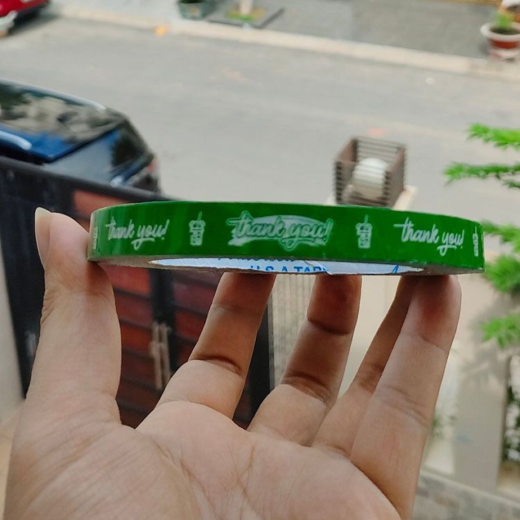  Băng keo in Thank You 12MM Nền Xanh Lá Chữ Trắng 