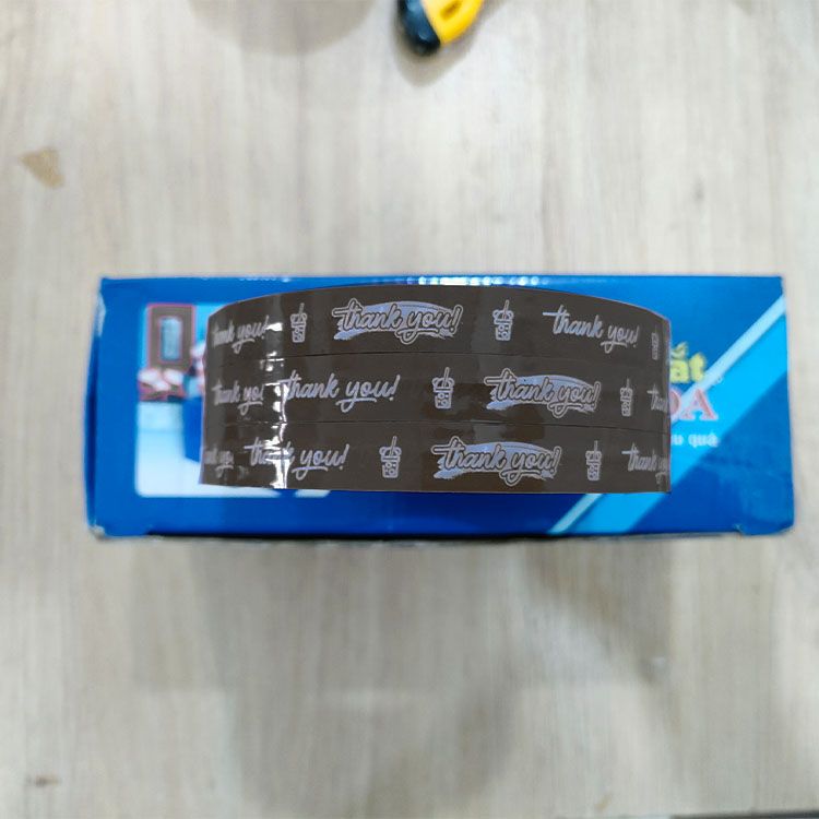  Băng keo in Thank You [12MMx72M] - Nền Nâu & Chữ Trắng Sữa 12TYxNMCT 