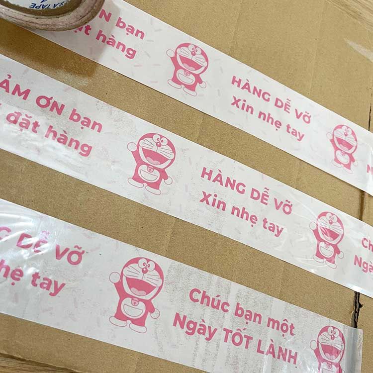  Băng keo in Hàng Dễ Vỡ - Doreamon [48MMx72M] Đỏ Tím & Trắng Sữa HDVxDRMxNTCM 