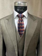 Suit Nâu Đất Cổ Nhọn
