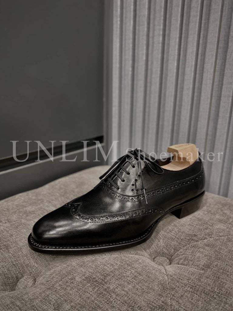 Giày Oxford Wingtip Đen Da Bò Ý Đế Nâu