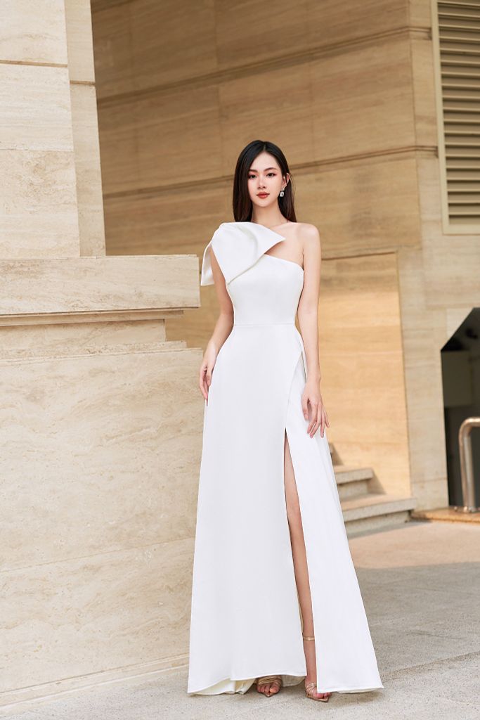 VÁY THIẾT KẾ XẺ ĐÙI PHỐI NƠ V950