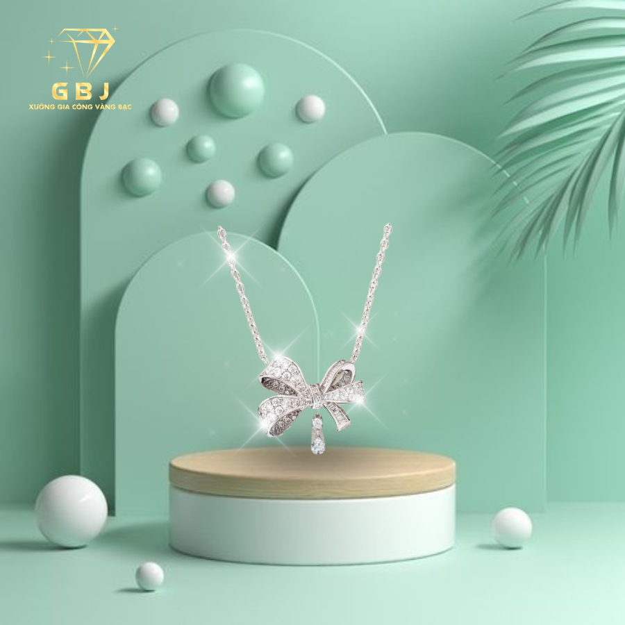 Dây Chuyền Nữ LM Nơ Viền Đá X.K 4T5 -GBJ52313- Gia Bảo Jewelry (Có Xi Kim)