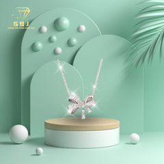 Dây Chuyền Nữ LM Nơ Viền Đá X.K 4T5 -GBJ52313- Gia Bảo Jewelry (Có Xi Kim)