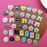  Jibbitz charms giả kim gắn dép sục cross 