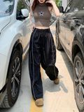  Quần jogger nữ dù ống rộng phối line 