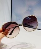 Kính hiệu Gucci màu mắt loang nhẹ