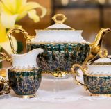 Bộ trà mạ vàng cao cấp nền xanh ngọc lục bảo